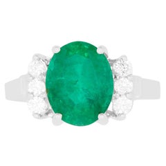 Oval Emerald Diamond Side Stone Cocktail Engagement Ring 18k White Gold