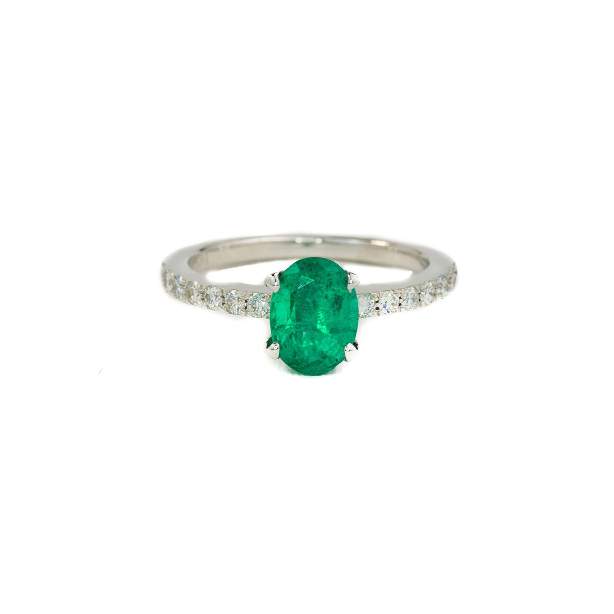 The simple band of diamonds highlight the natural green color.

Oval design rings are the perfect shape for slender fingers.

This is a custom made ring and will take 1-2 weeks to complete.

Make your proposal unique and special for her with this