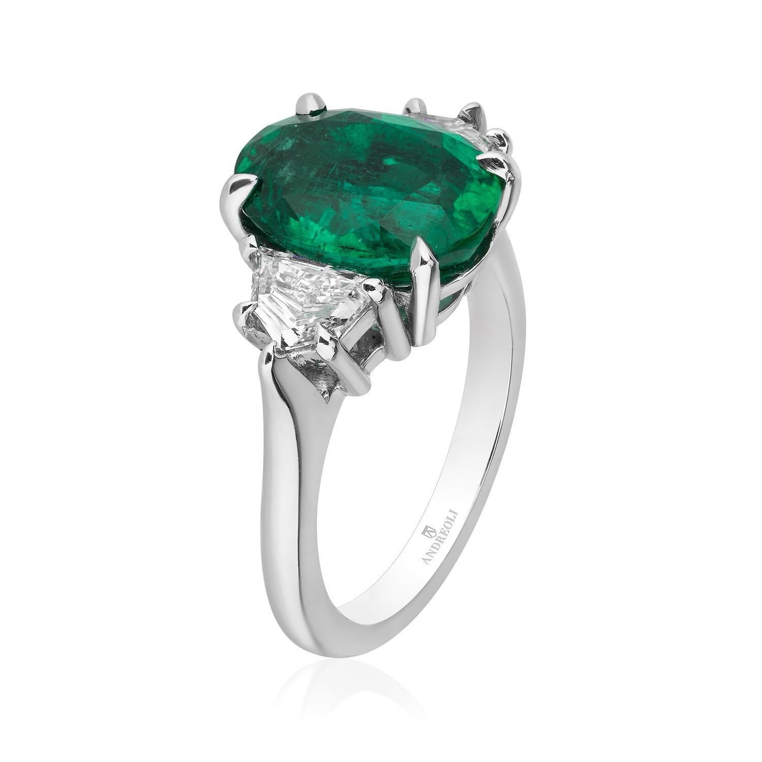 Oval Emerald Engagement Ring with Diamond Side Stones Platinum Andreoli

This Andreoli Engagement ring features a 4.38 carat oval emerald certified by CDC Switzerland Gemology Lab as a vivid green emerald with an origin from Zambia.

Flanked by two