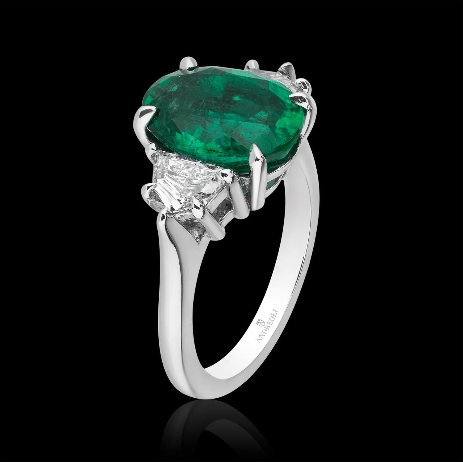 oval emerald ring with diamonds