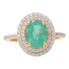 Anello con smeraldo ovale e doppio diamante aureolato in oro massiccio 14k (certificato)