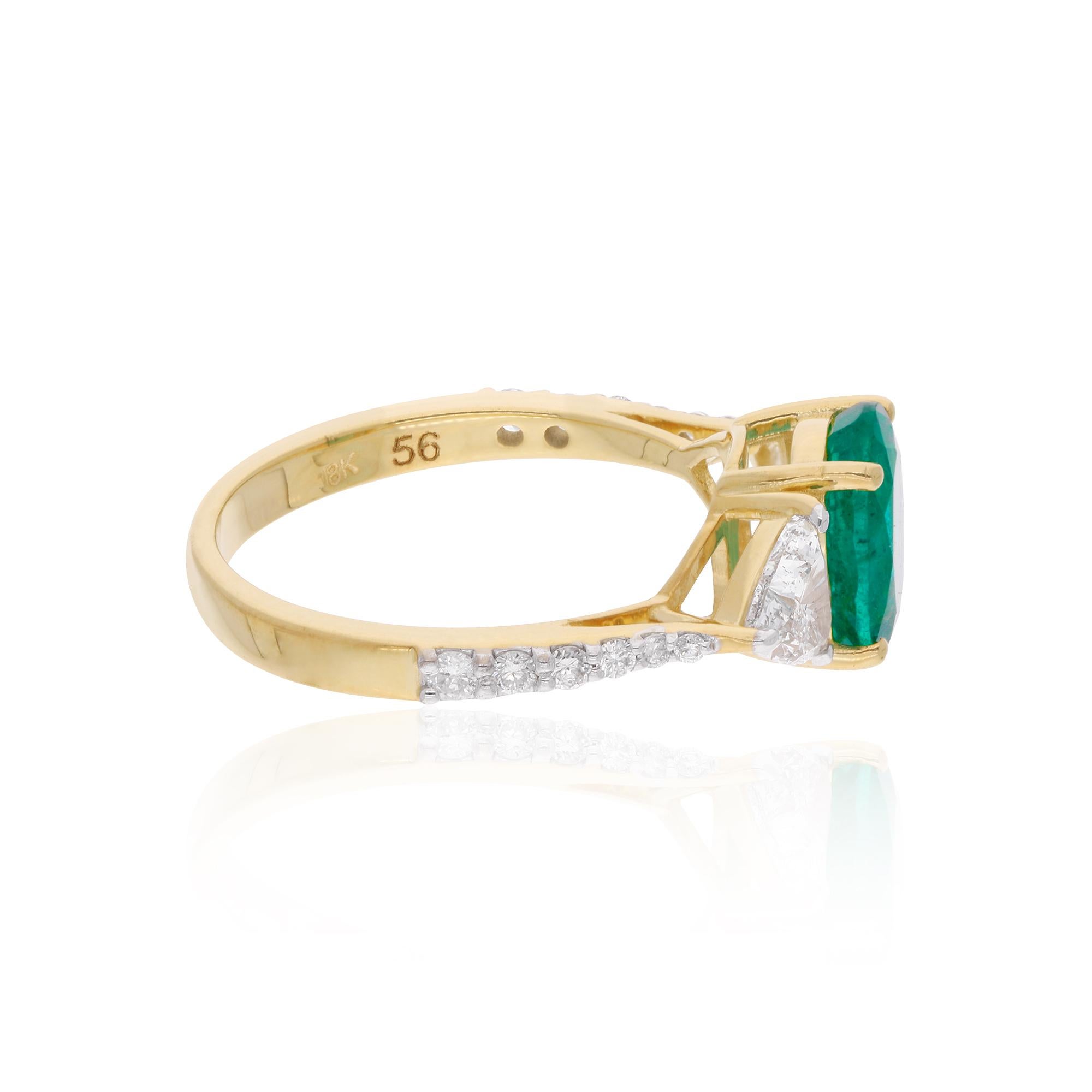 Immerse yourself in the enchanting beauty of this Oval Emerald Gemstone Ring, adorned with dazzling Diamonds and meticulously handcrafted in luxurious 18 Karat Yellow Gold. This exquisite piece of fine jewelry is a celebration of elegance and