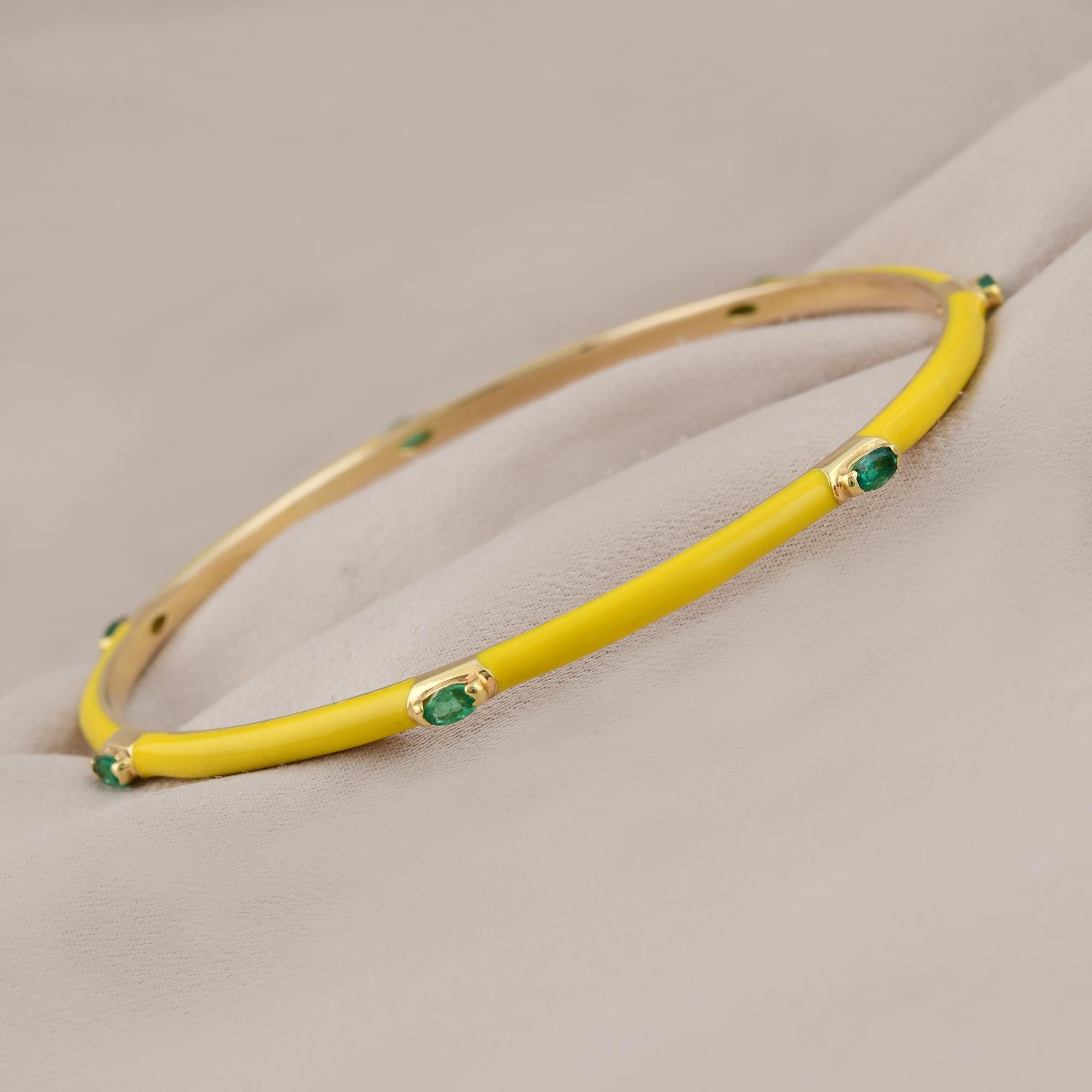 Modern Oval Emerald Gemstone Sleek Bangle Yellow Enamel Bracelet 14 Karat Yellow Gold For Sale