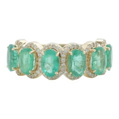 Anillo de diamantes con halo de esmeralda ovalada en oro macizo de 14k (certificado)