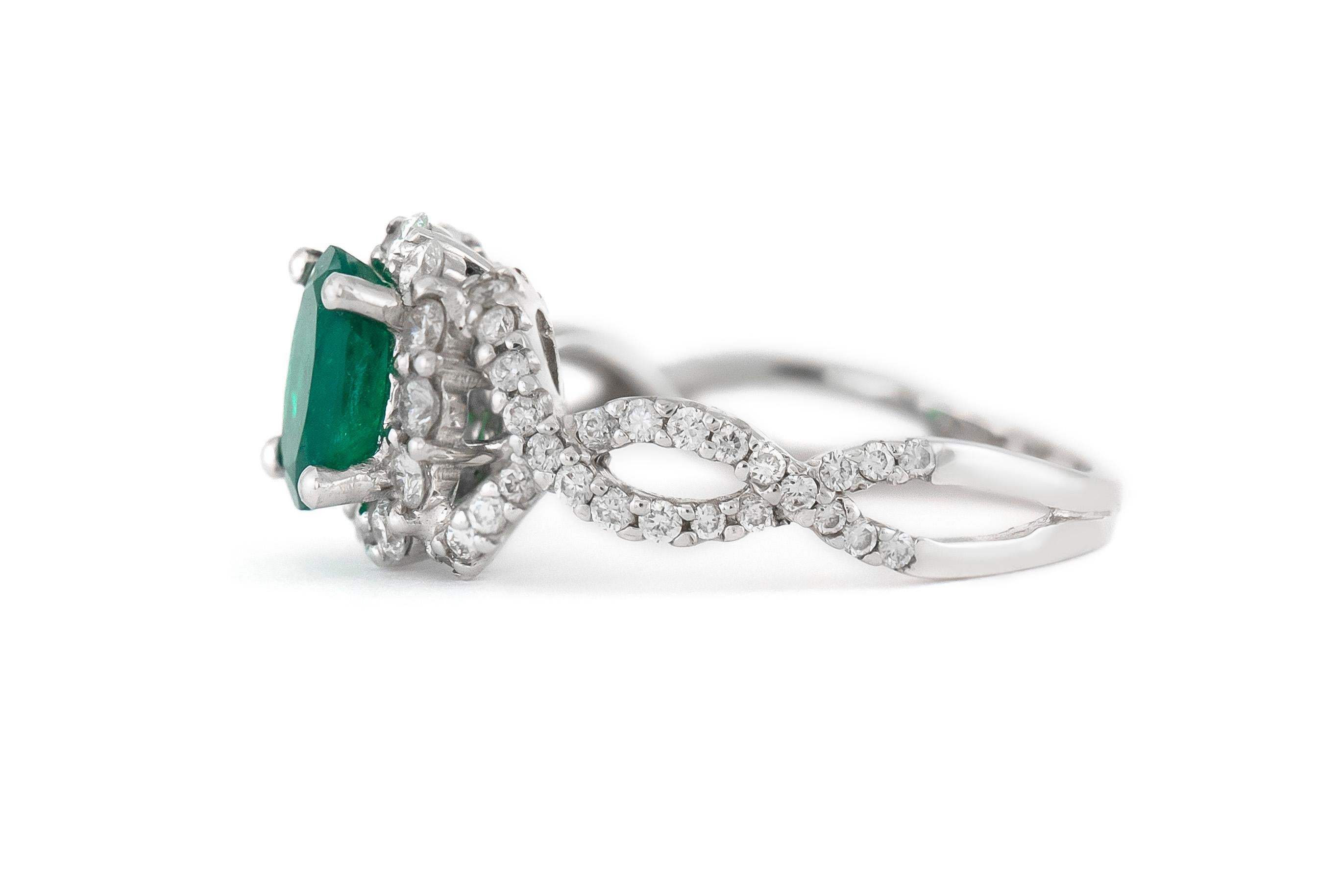 The ring is finely crafed in 18k white gold with center beautiful emerald weighing approximately total of 1.07 carat and diamonds weighing approximately total of 0.80 carat.
Circa 1950.