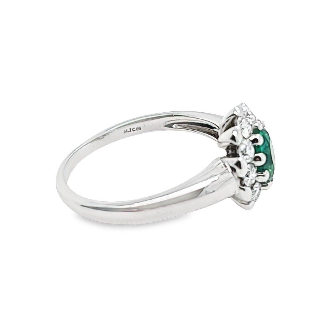 Oval Emerald Ring with Diamond Halo For Sale 1