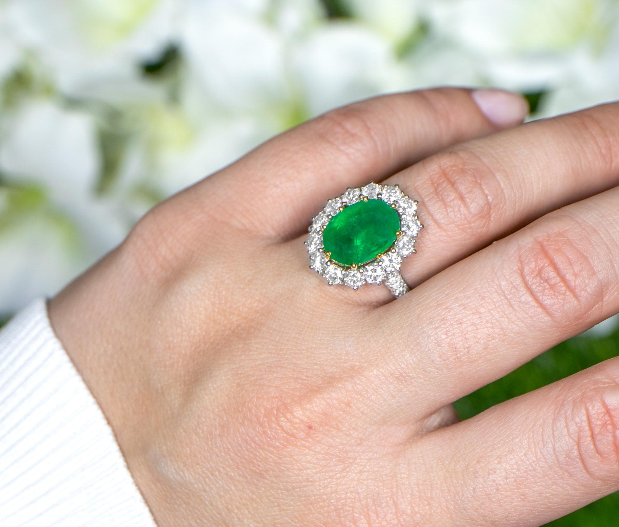 Art Deco Oval Emerald Ring With Diamond Halo Setting 6.24 Carats 18K Gold For Sale