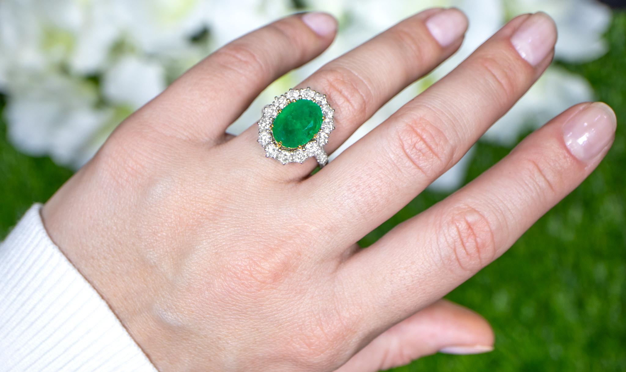 Oval Emerald Ring With Diamond Halo Setting 6.24 Carats 18K Gold In Excellent Condition For Sale In Laguna Niguel, CA