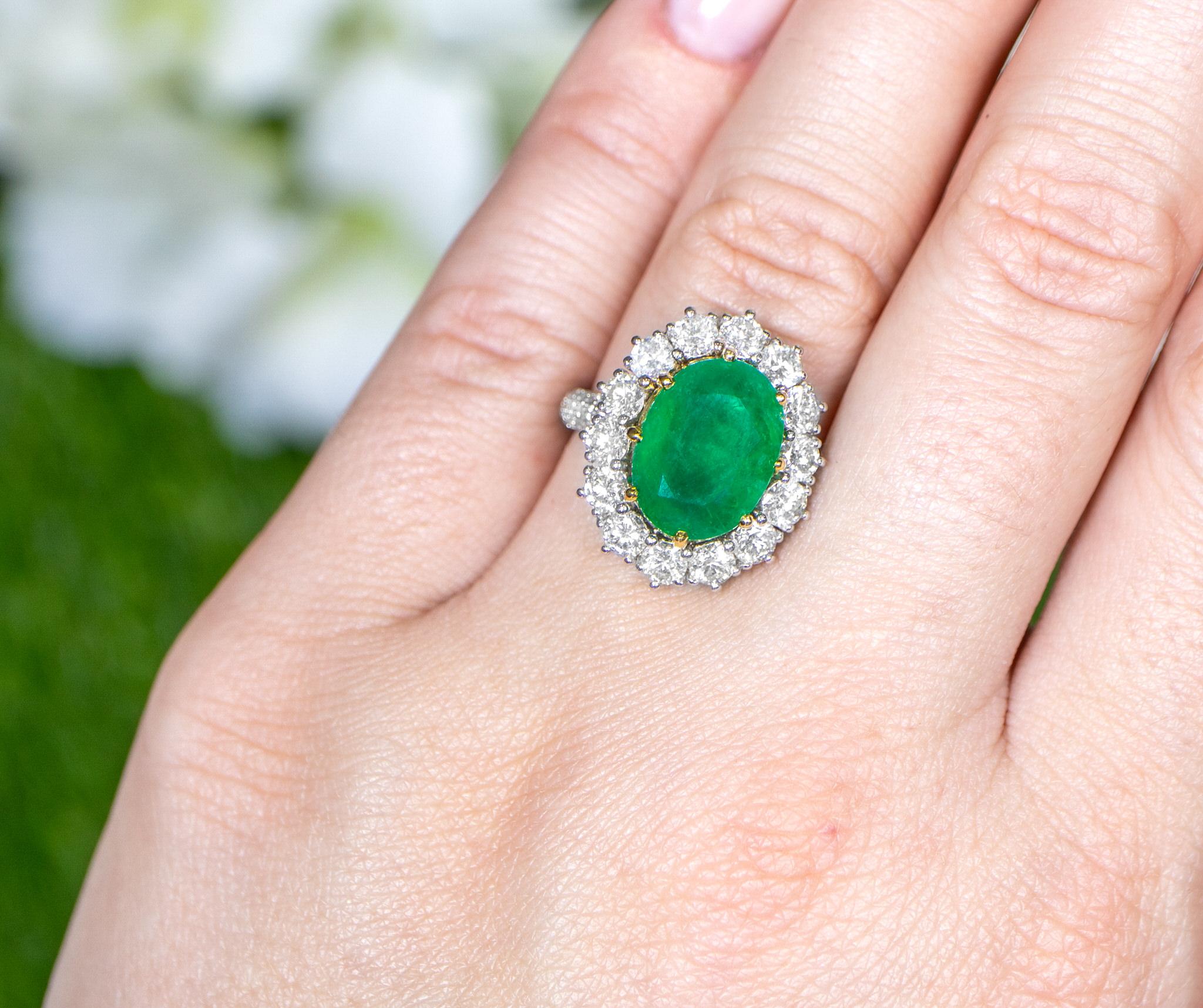 Oval Emerald Ring With Diamond Halo Setting 6.24 Carats 18K Gold For Sale 1