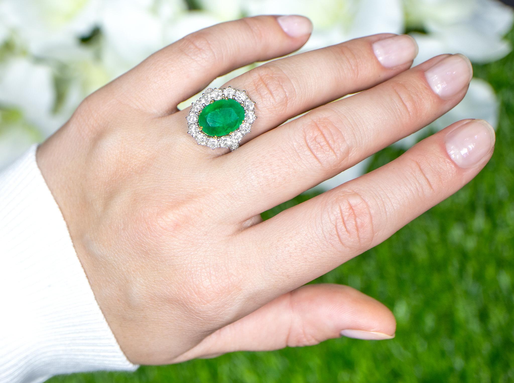 Oval Emerald Ring With Diamond Halo Setting 6.24 Carats 18K Gold For Sale 2