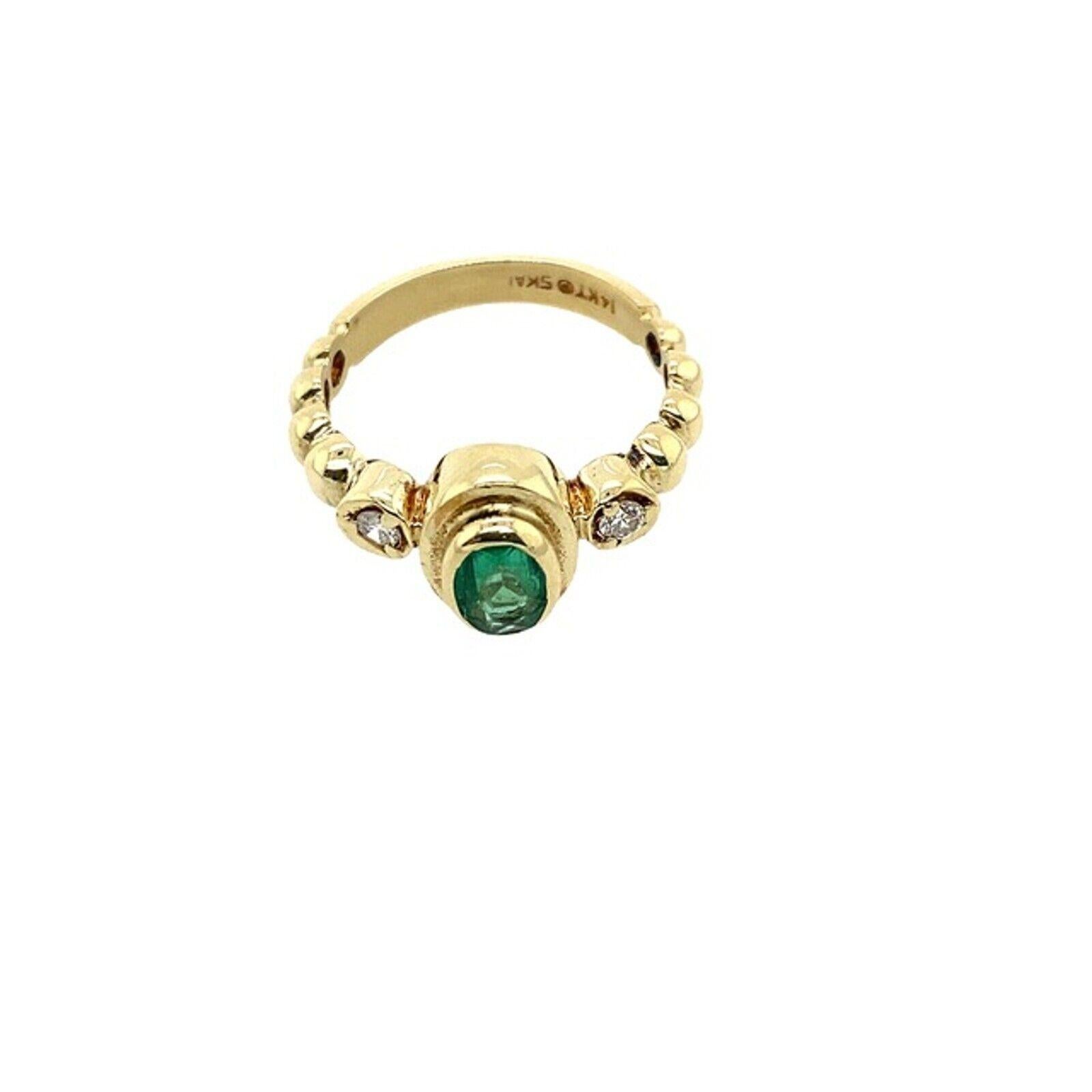 Oval Cut Oval Emerald & Round Diamonds 3-Stone Ring Set in 14ct Yellow Gold For Sale