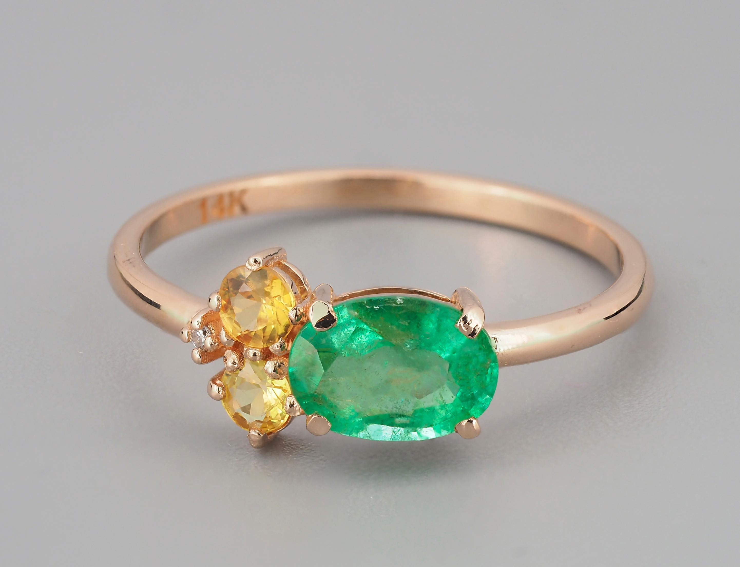 Oval emerald, sapphire and diamonds 14k gold ring. 
Emerald gold ring. Emerald cluster ring.

Metal: 14k solid gold.
Weight: 1.8 (depends from size).

Set with emerald color - green
oval cut, aprox 0.80 ct
Clarity: Transparent with