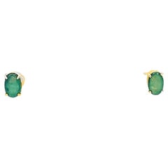Oval Emerald Stud Earrings in Yellow Gold