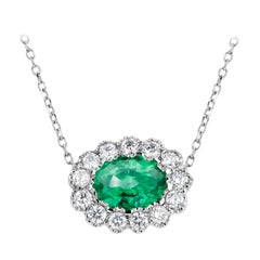 Oval Emerald Surrounded by Diamonds White Gold Drop Layered Necklace Pendant