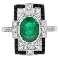 Oval Emerald with Diamond Onyx Rectangular Shape Ring in 18k White Gold