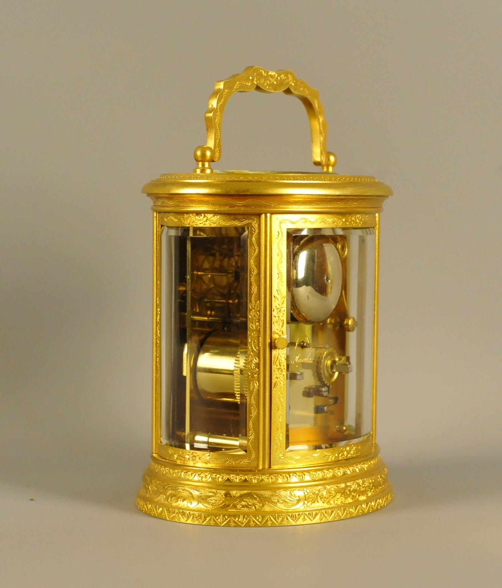 Ormolu Oval Engraved Bell Striking Carriage Clock with Case For Sale