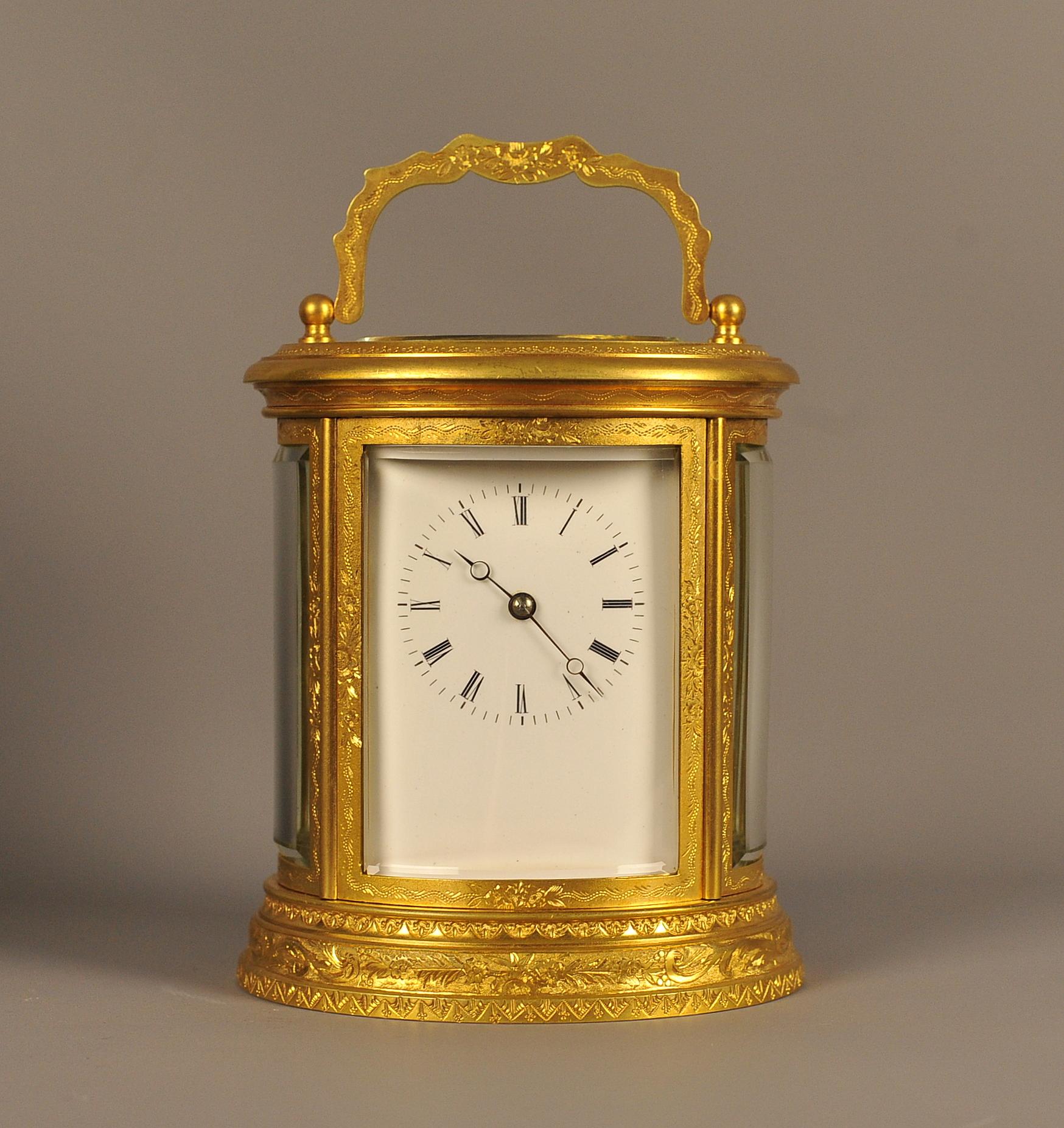 Oval Engraved Bell Striking Carriage Clock with Case For Sale 2