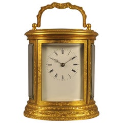 Antique Oval Engraved Bell Striking Carriage Clock with Case