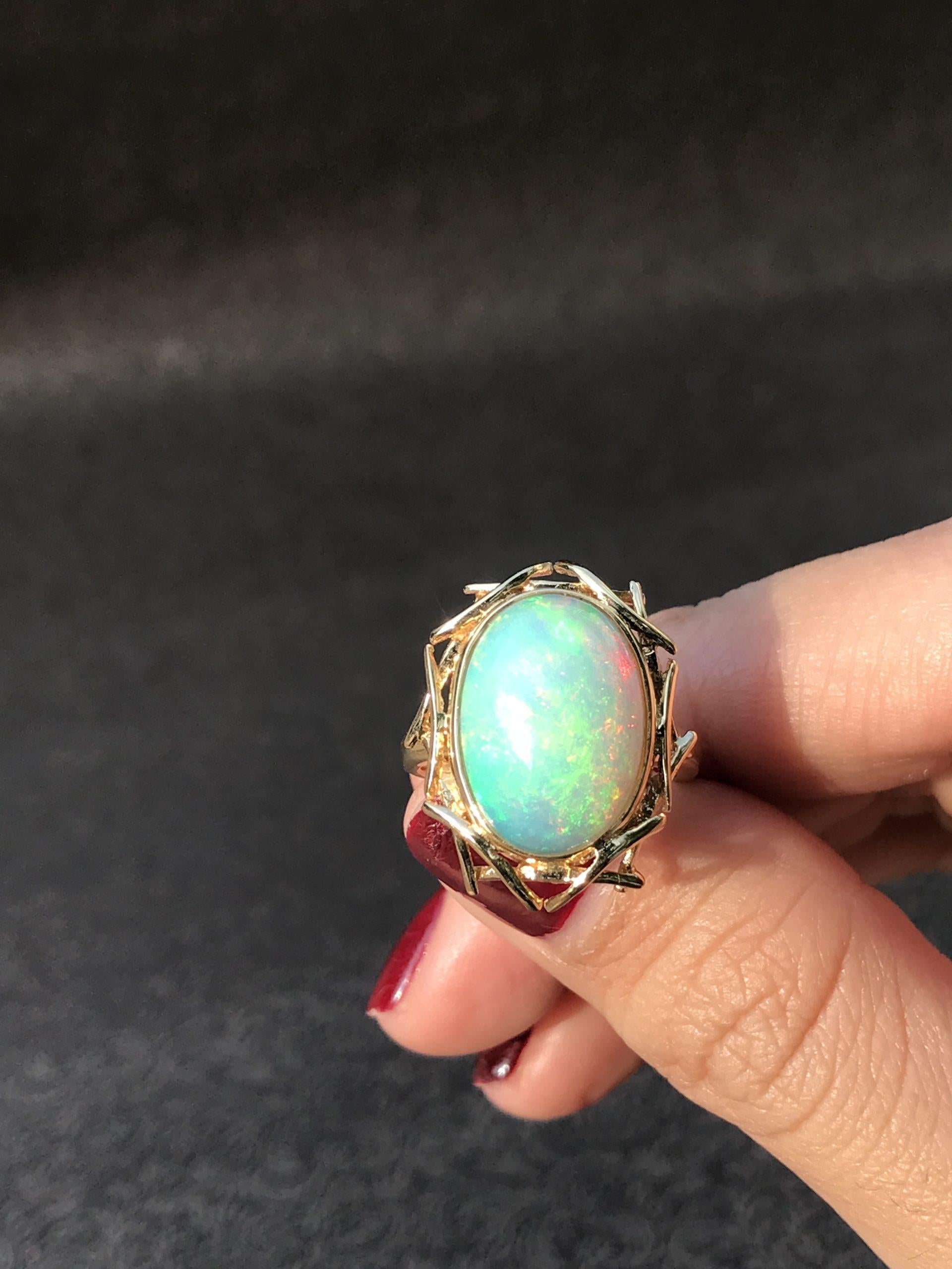 Oval Ethiopian Opal Bird Nest Design Cocktail 18K Yellow Gold Ring For Sale 1