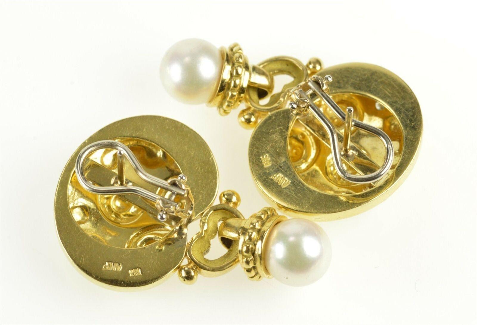 Item:  18K Oval Etruscan Revival Diamond Pearl Statement Earrings Yellow Gold

Weight:  20.3g

Gem Stone:  8x=Diamond 2x=Pearl

Composition:  18k Gold Marked

Condition:  Estate:Good

Era:  Vintage

Measure*:  24.4mm (w) 37.9mm (h) 6.1mm (d)