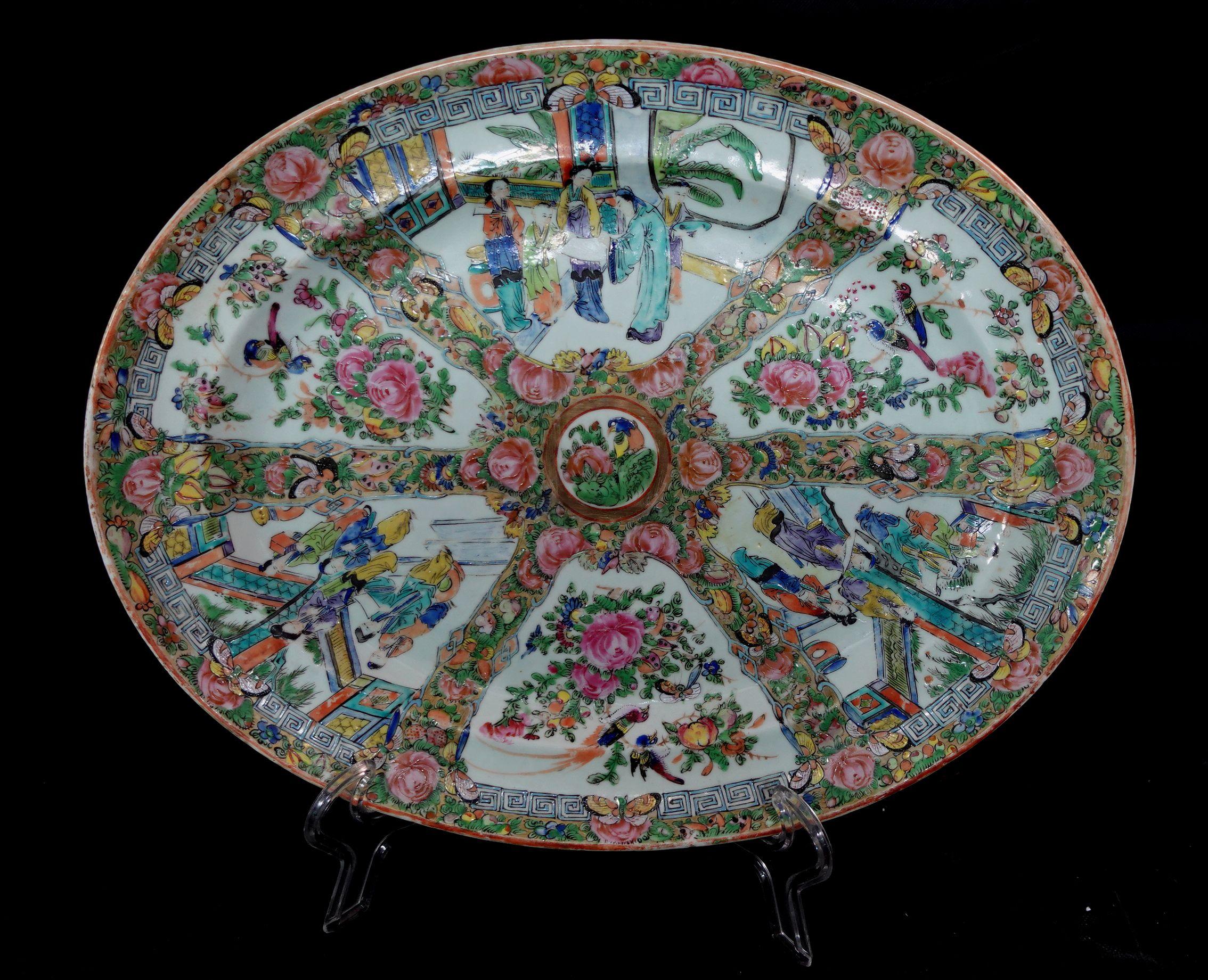Oval Famille Rose Export Porcelain Platter depicting figures, floral and birds, early 19th Century.
 