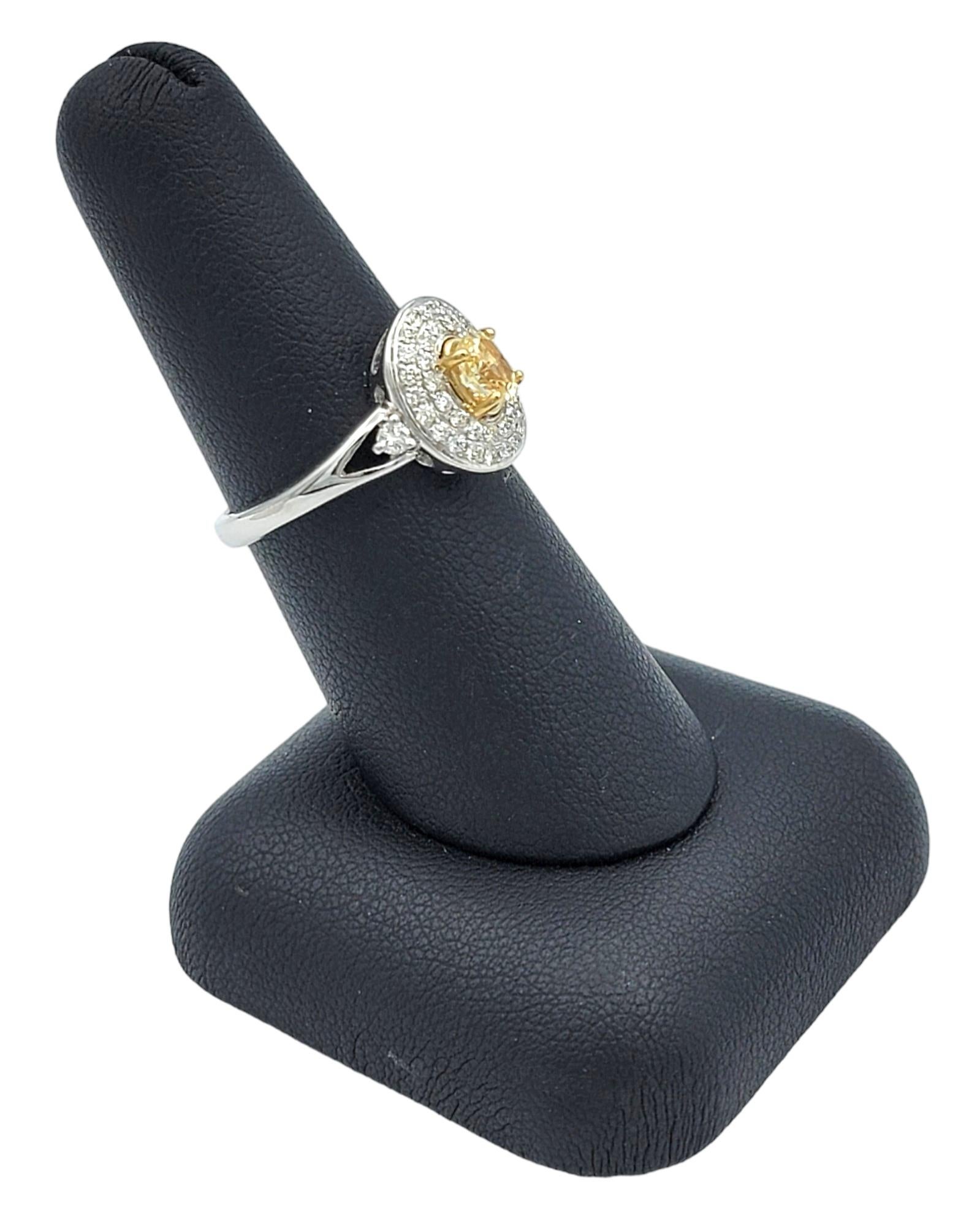 Oval Fancy Yellow Diamond with White Diamond Double Halo Set in White Gold For Sale 3