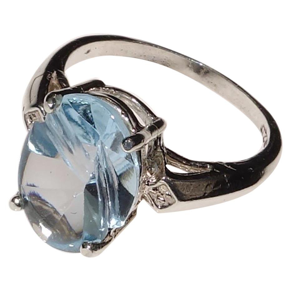 Oval Fantasy Cut Blue Topaz Set in Sterling Silver Ring