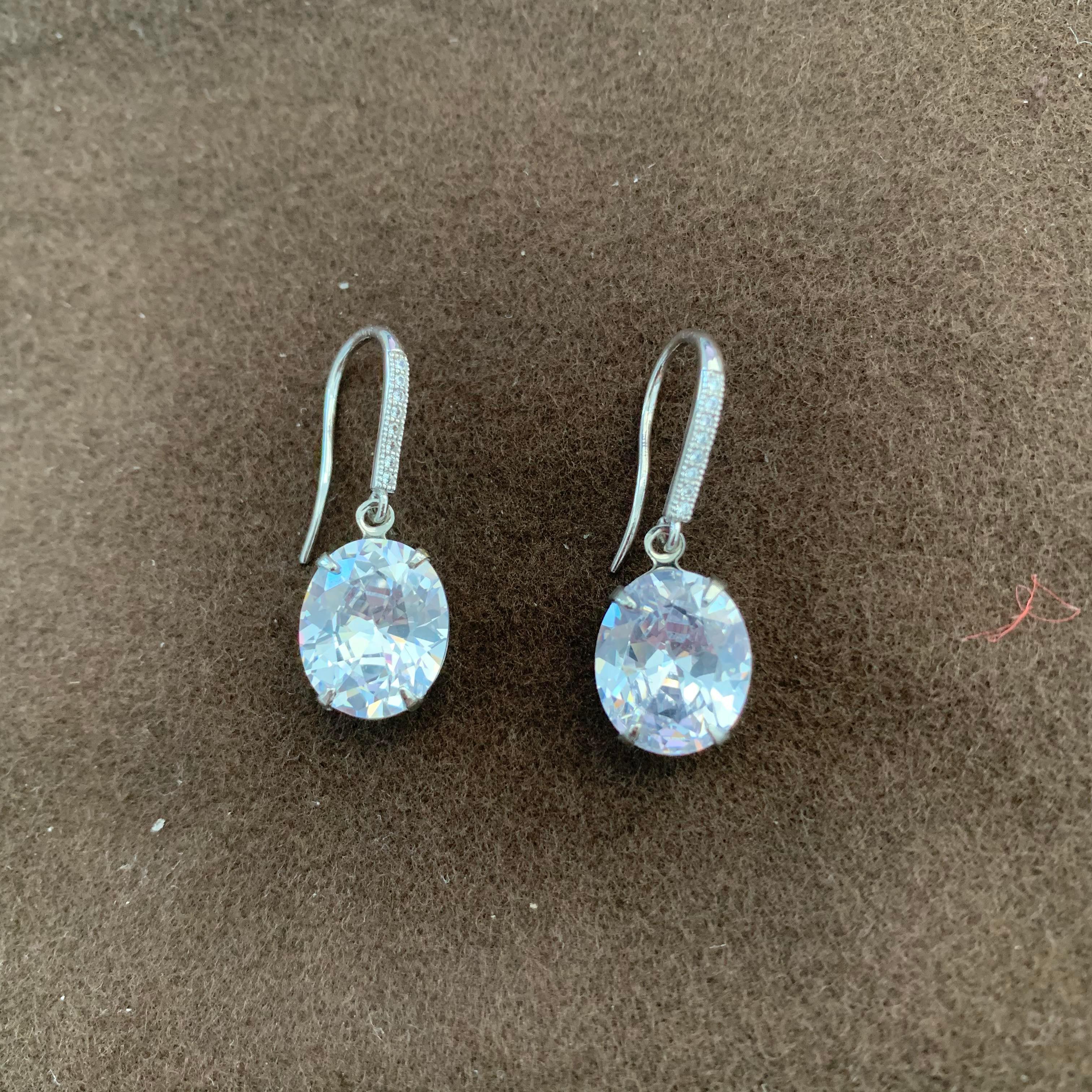 Oval Faux Diamond on micropave sterling silver hook earrings 1