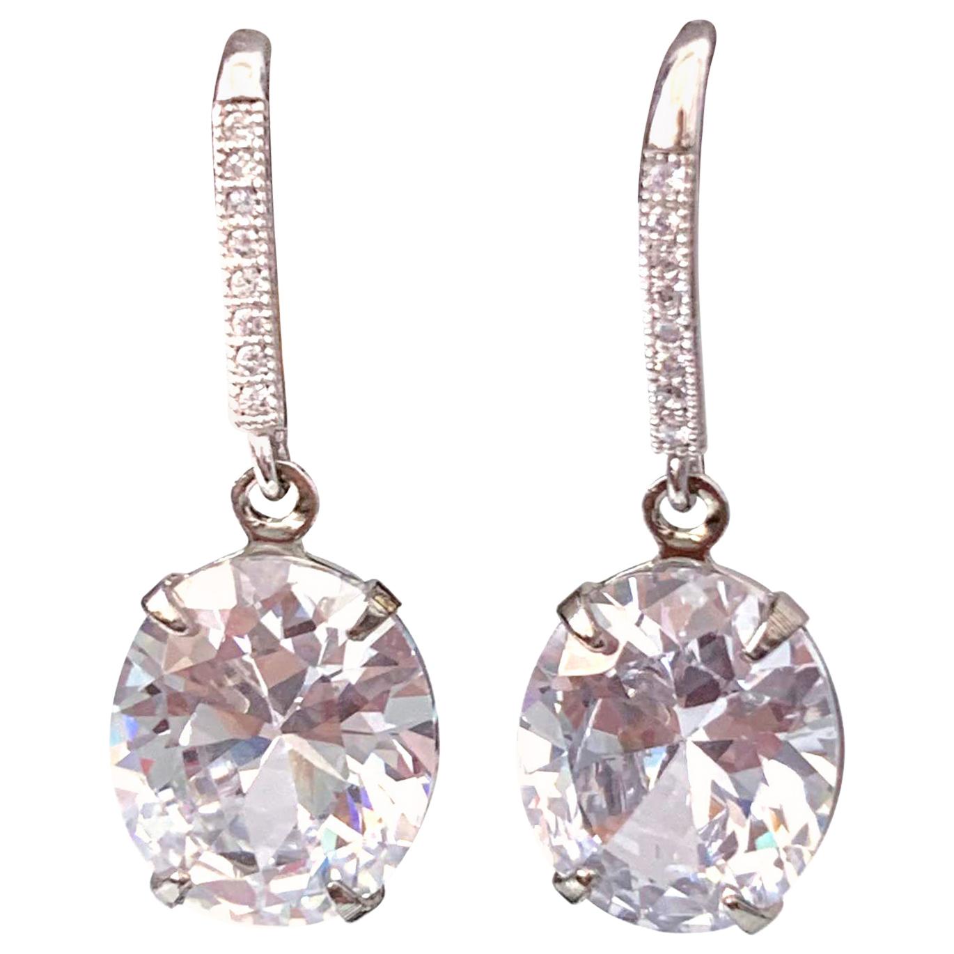 Oval Faux Diamond on micropave sterling silver hook earrings