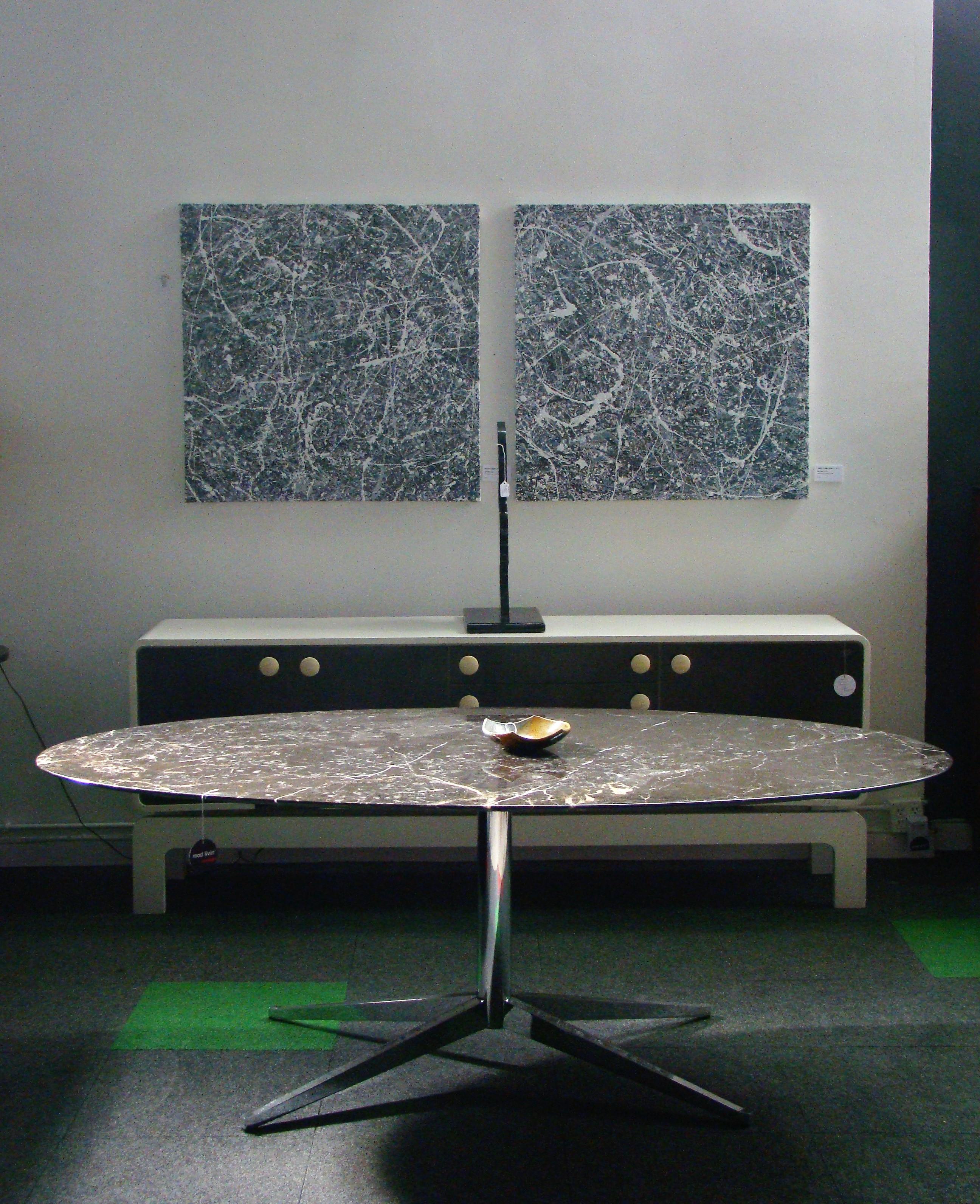 Stunning, iconic Florence Knoll designed for Knoll Associates, oval table desk with a 'galaxy pattern' black malochite, knife-edge marble top and chrome steel base. Measures: 78
