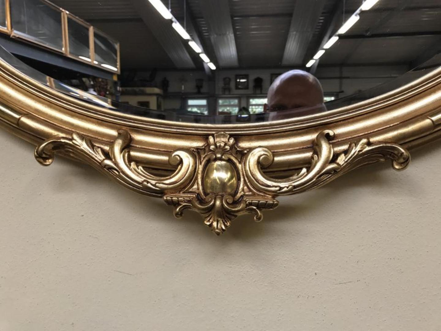Italian Oval Florentine Antique Mirror with a Gilt Frame For Sale