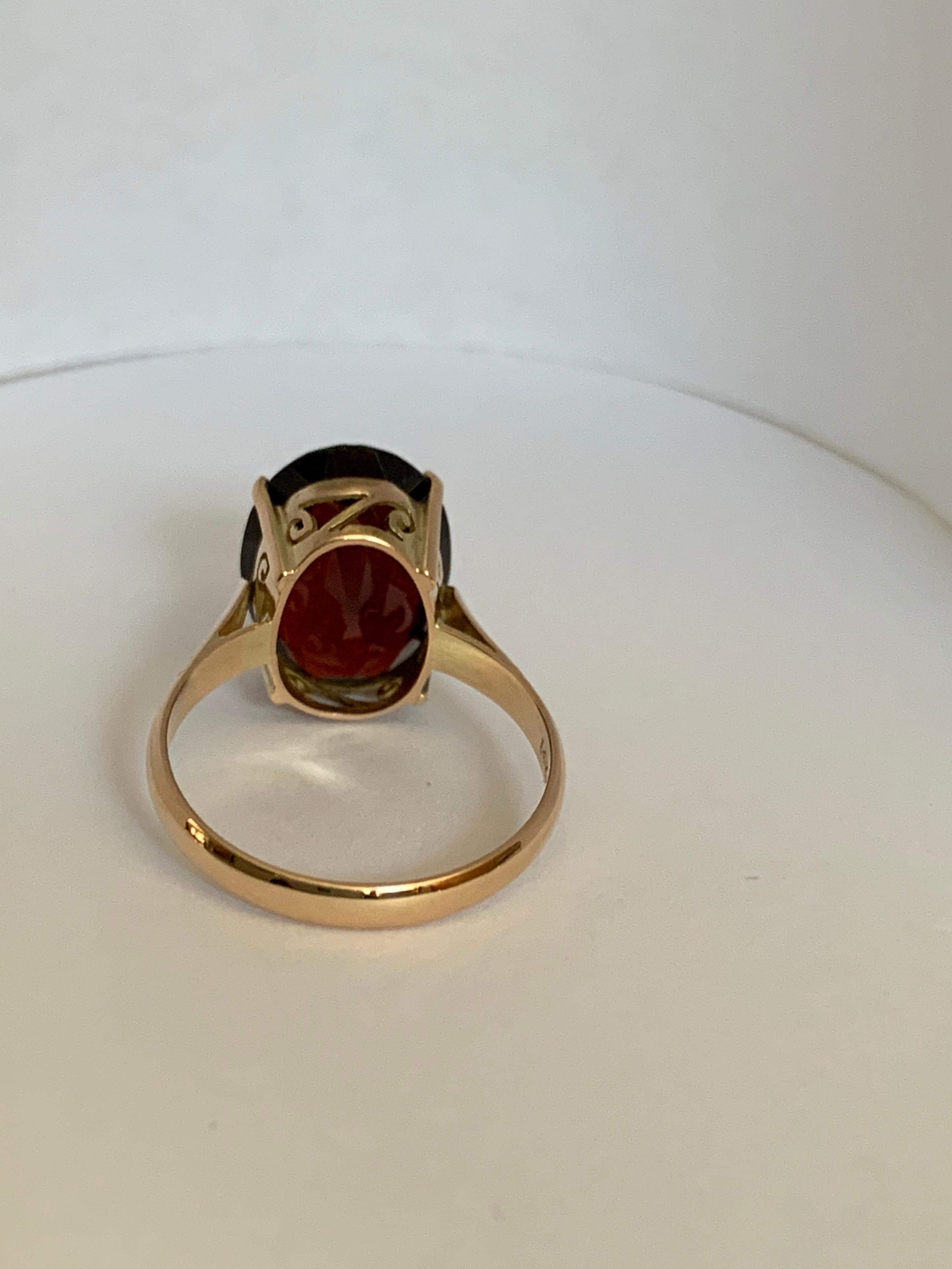 Oval Garnet Set in 14 Karat Yellow Gold Ring In New Condition For Sale In Trumbull, CT