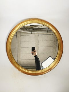 Oval gilded wood mirror, 20th century, France