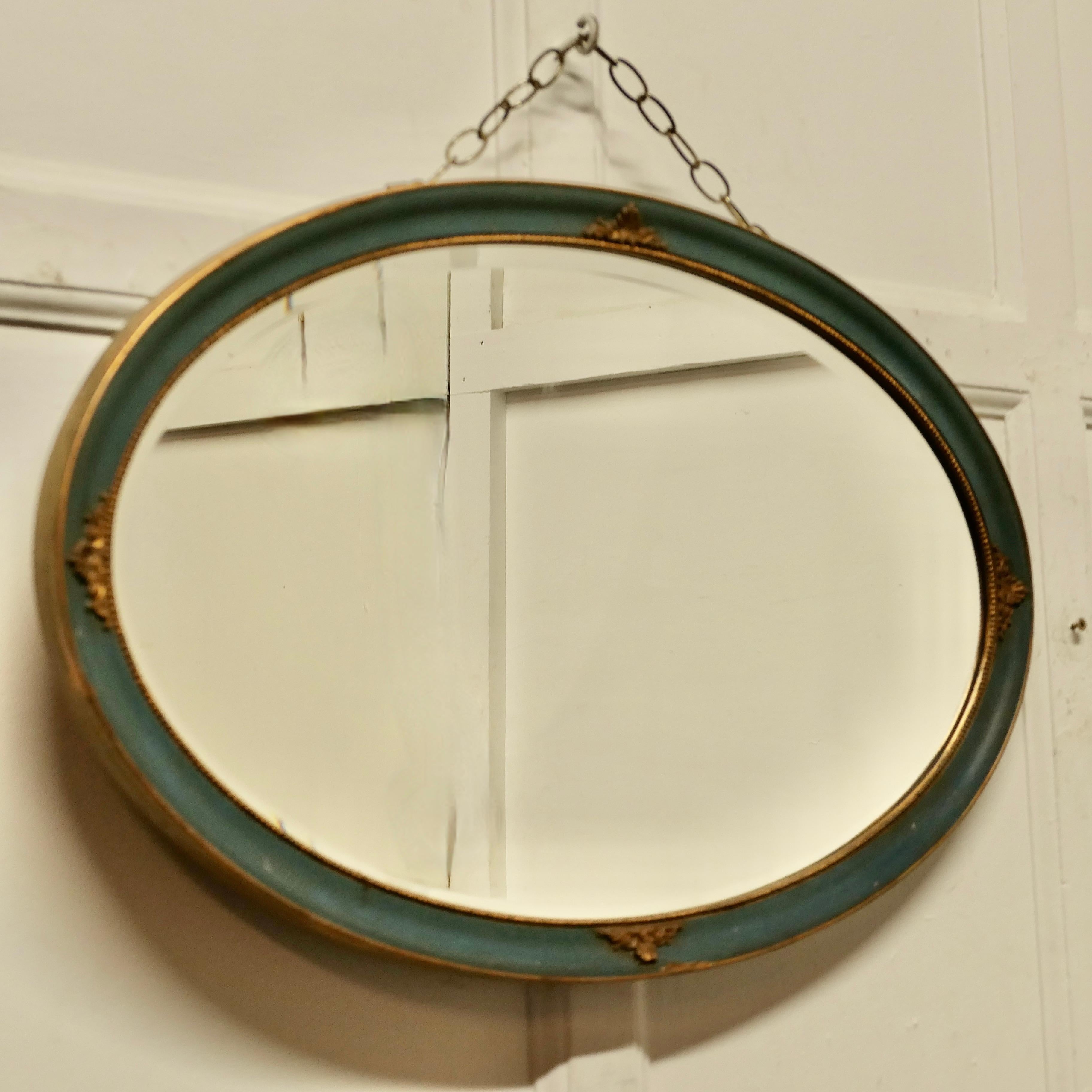Oval Gilt and Painted Wall Mirror  This Mirror has a moulded oval frame   In Good Condition For Sale In Chillerton, Isle of Wight