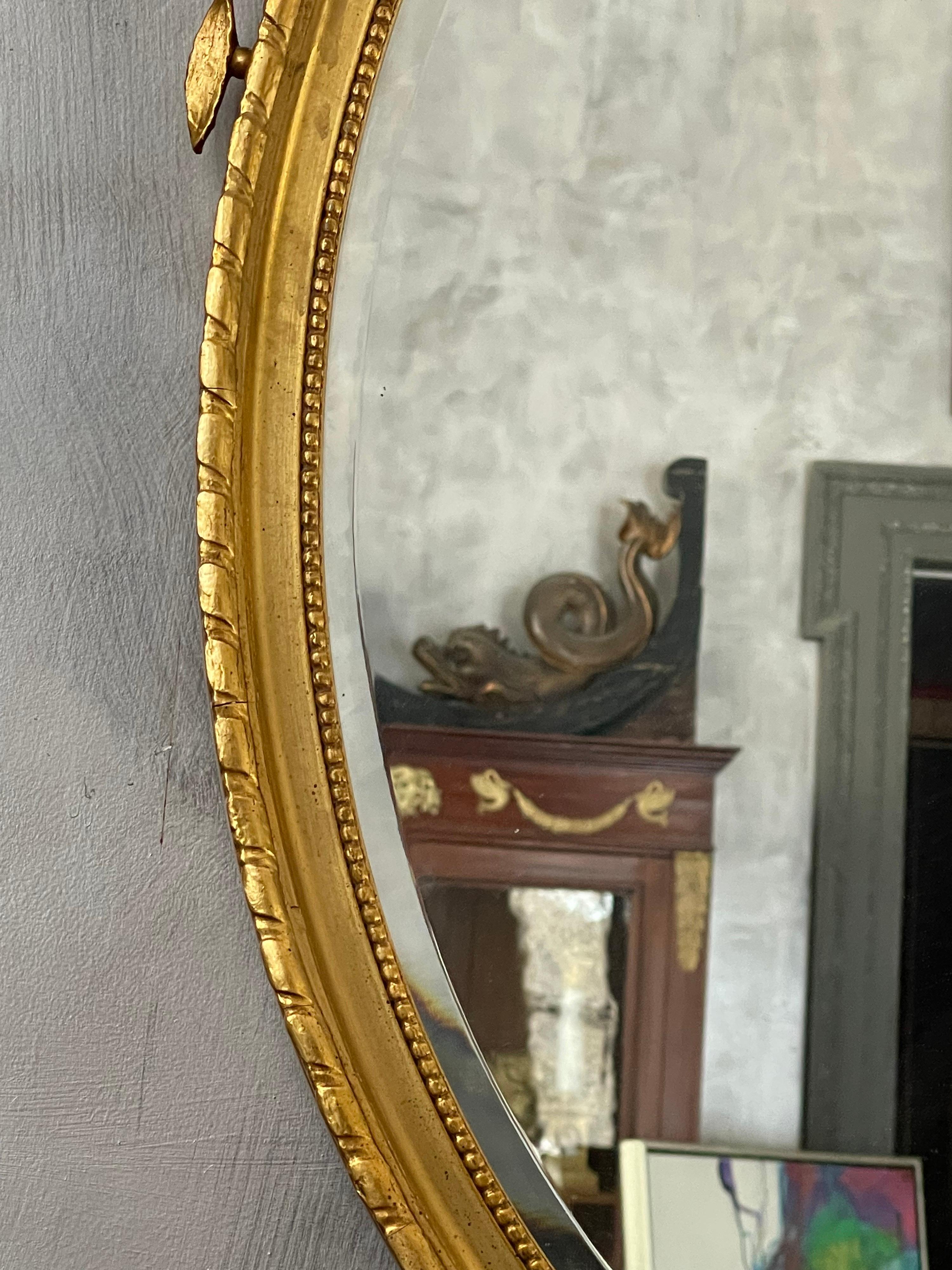 North American Oval Gilt Wood Mirror