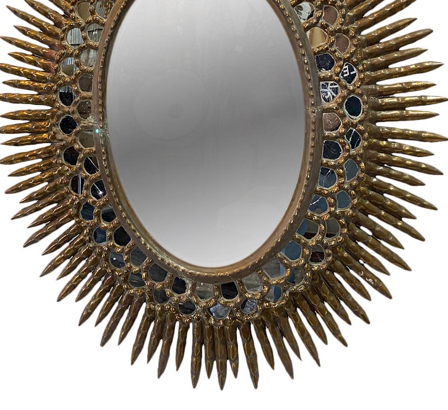 oval sunburst mirror