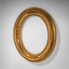 Cadre de miroir ovale en bois doré, 19e siècle