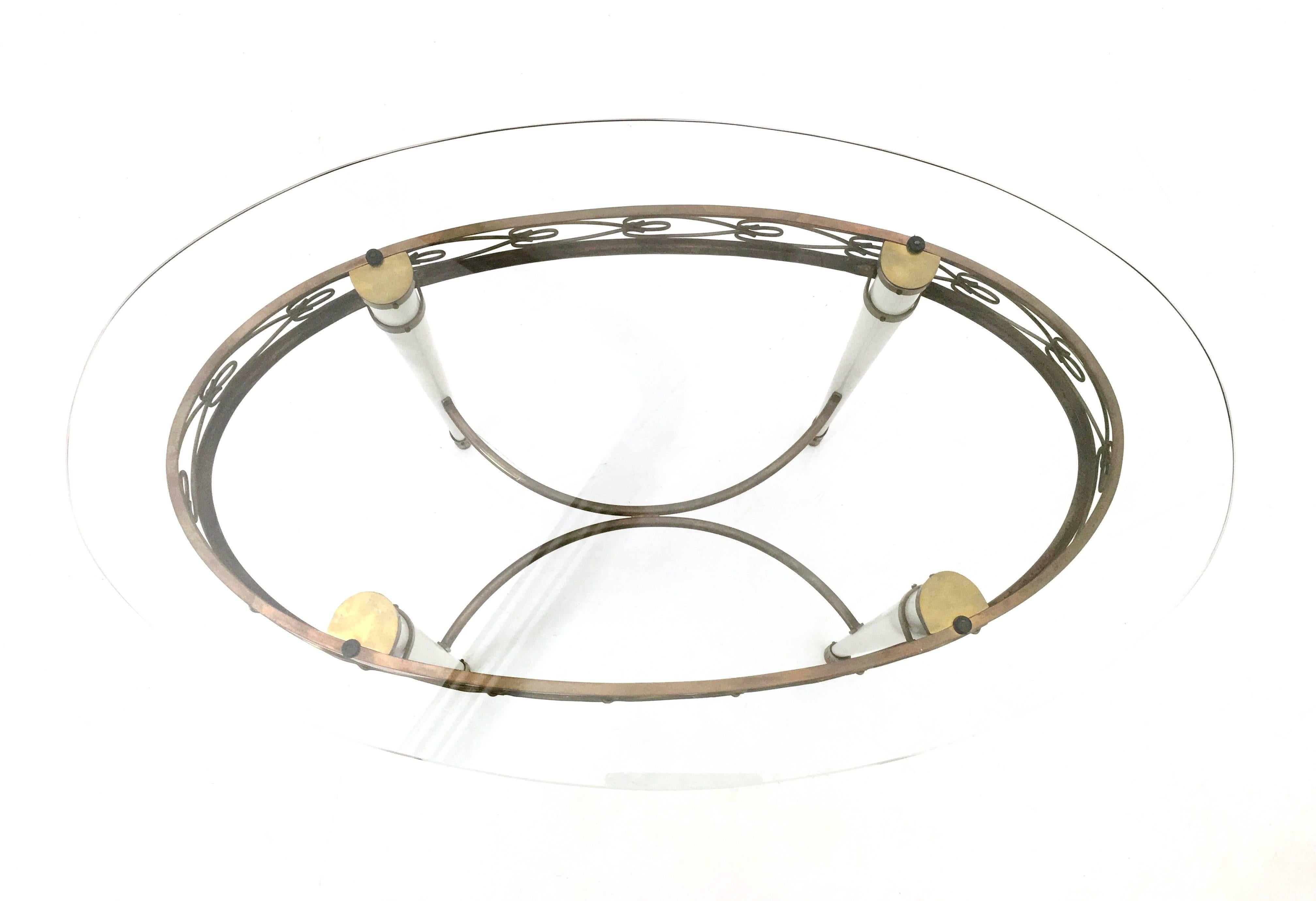 Brass Coffee Table with an Oval Glass Top in the Style of Pierluigi Colli, Italy For Sale 1