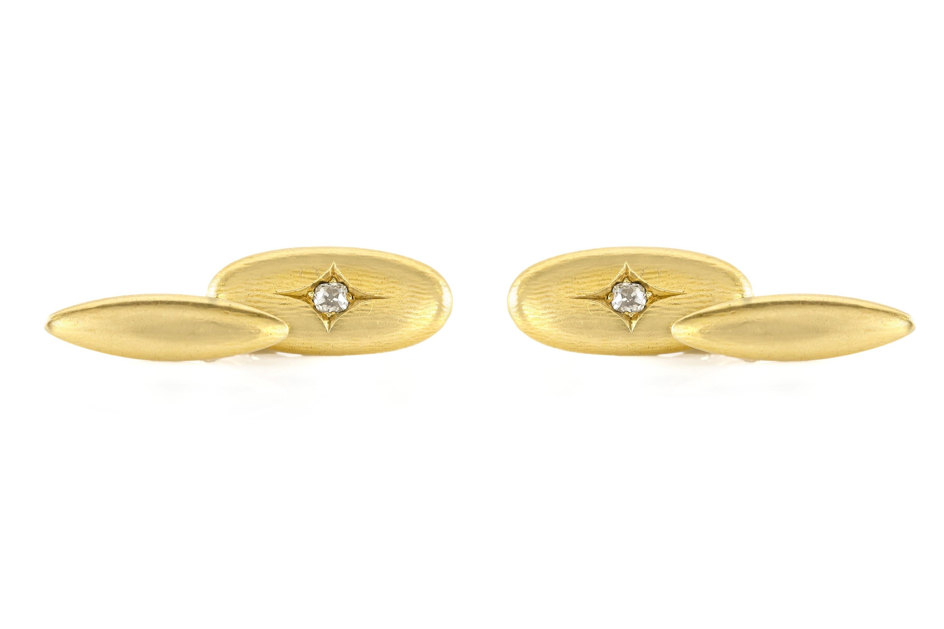 Cufflinks finely crafted in 18k yellow gold weighing a total of 3.00 dwt., with a tiny diamond of weight of 0.30k, size of each cufflink is 0.5 inch. Circa 1980.