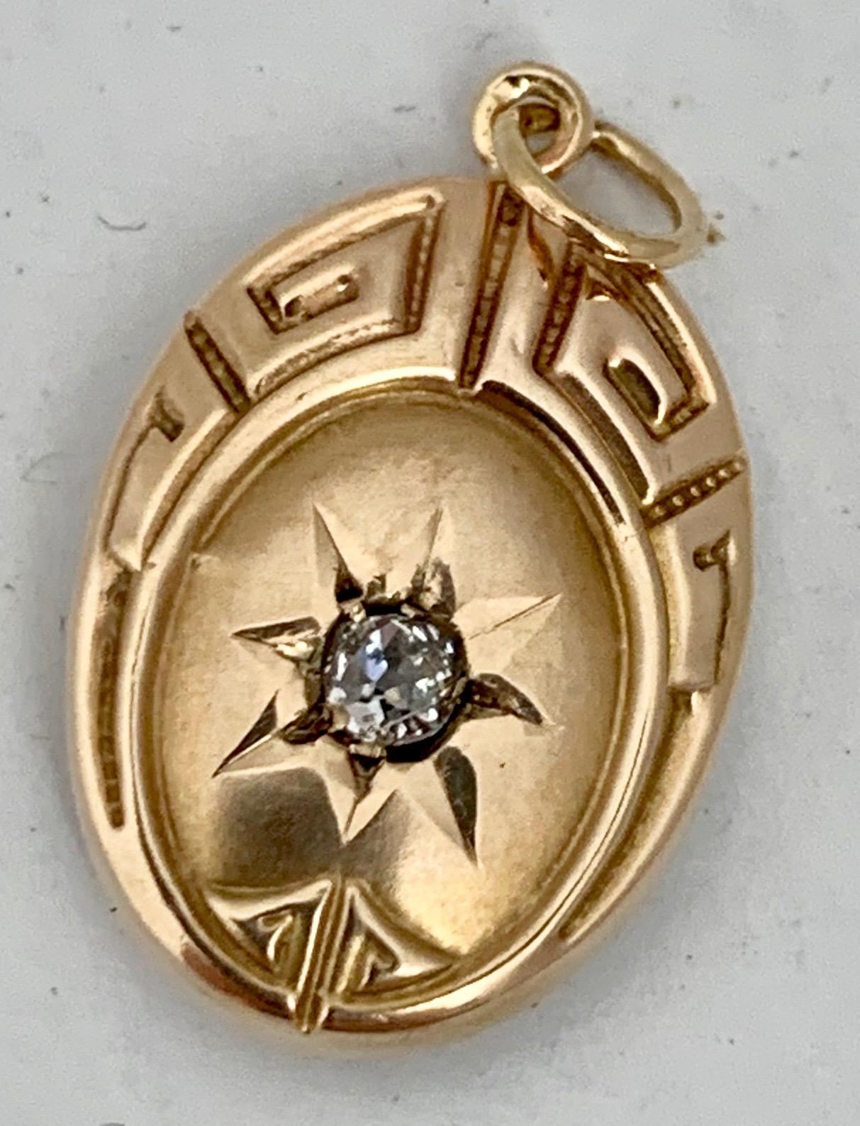  Pendant of Oval Shape with Greek Key Motif & Diamond set in 10K Yellow Gold  In Good Condition In West Palm Beach, FL