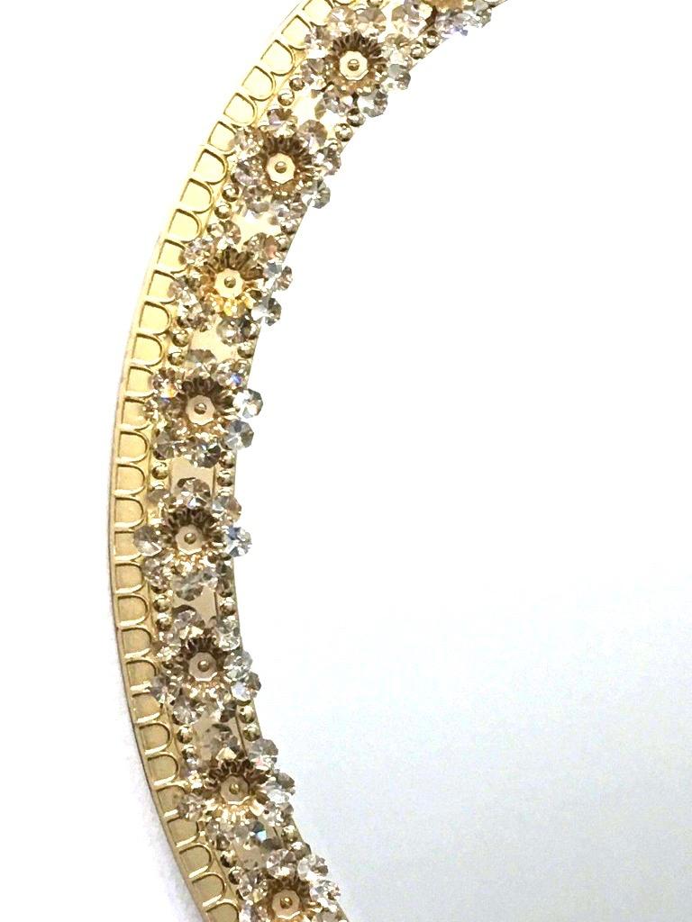 Hollywood Regency Oval Gold Plated Brass and Crystal Flowers Mirror by Palwa, circa 1960s