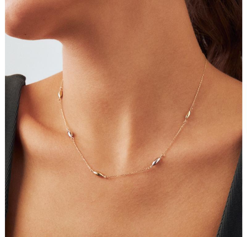 Introducing the 14K Solid Gold Dainty Bead Necklace, a reflection of Orena Jewelry's unwavering commitment to exemplary artisanship. Every necklace is meticulously handcrafted, radiating a fusion of modest luxury and enduring grace. It is an