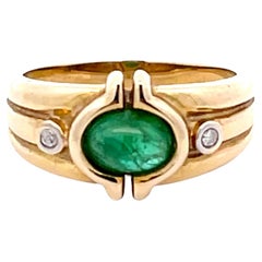 Ovaler grüner Cabochon-Smaragd- und Diamantring aus 14 Karat Gelbgold
