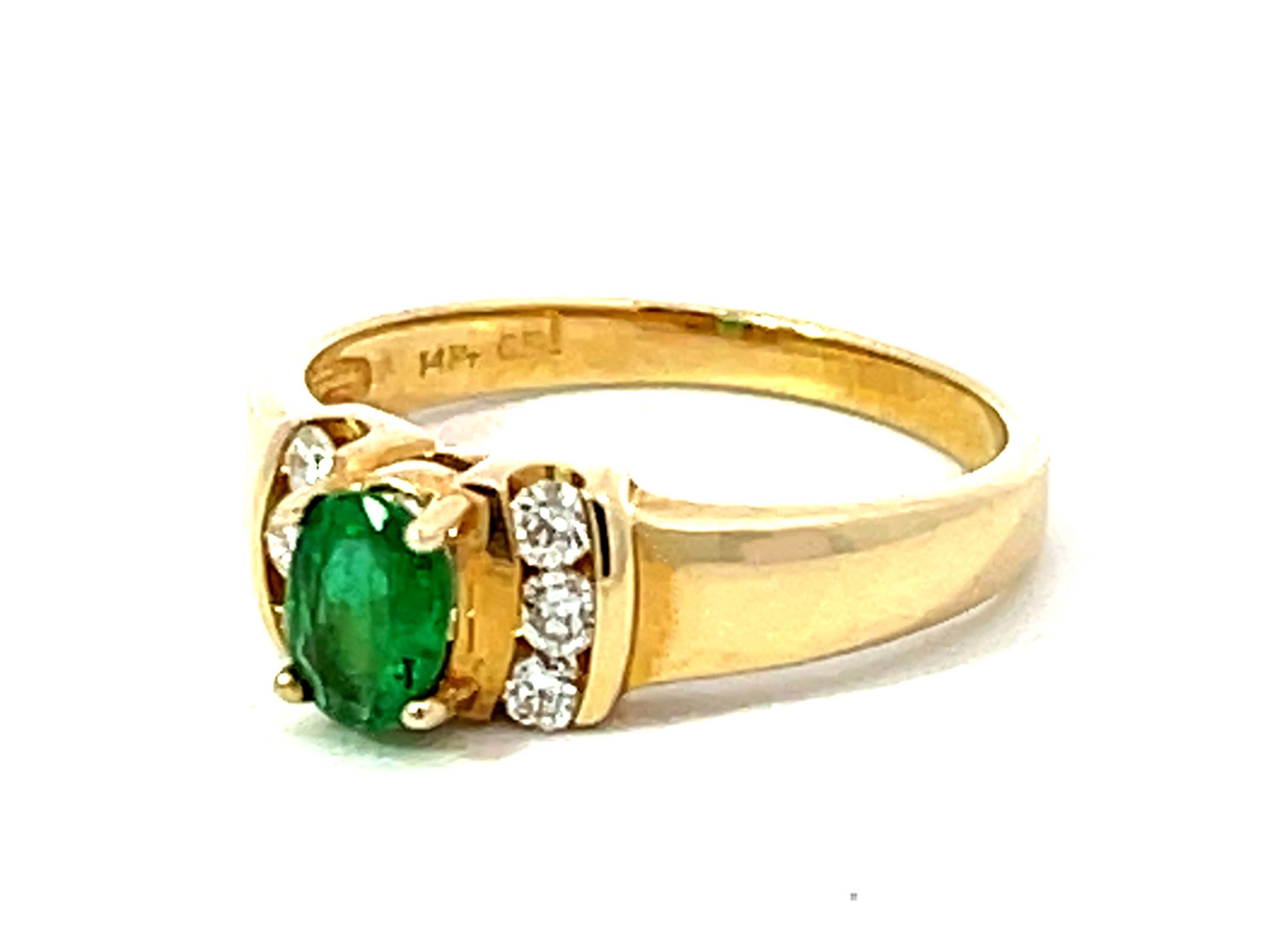 Brilliant Cut Oval Green Emerald and 6 Diamond Stackable Ring in 14k Yellow Gold For Sale