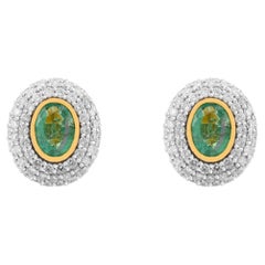 Oval Green Emerald and Double Diamond Halo Stud Earrings in 14K Yellow Gold