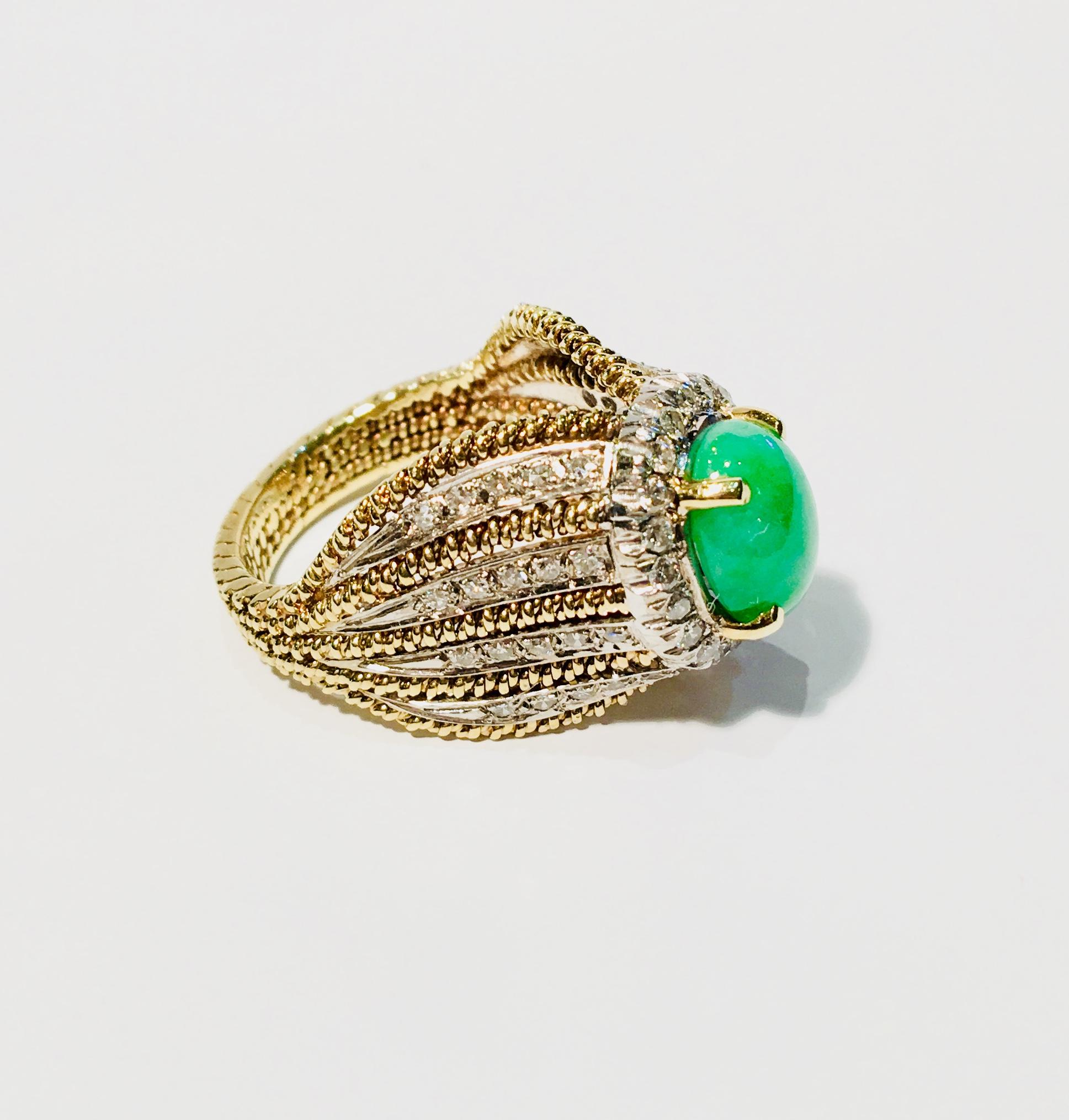 Very unique, high fashion estate ring features a bright, light apple green, variegated, oval cut jade stone, prong set and surrounded by a sparkling halo of 20 round brilliant diamonds. Elaborate side detail features 5 ropes of 14 karat yellow gold,