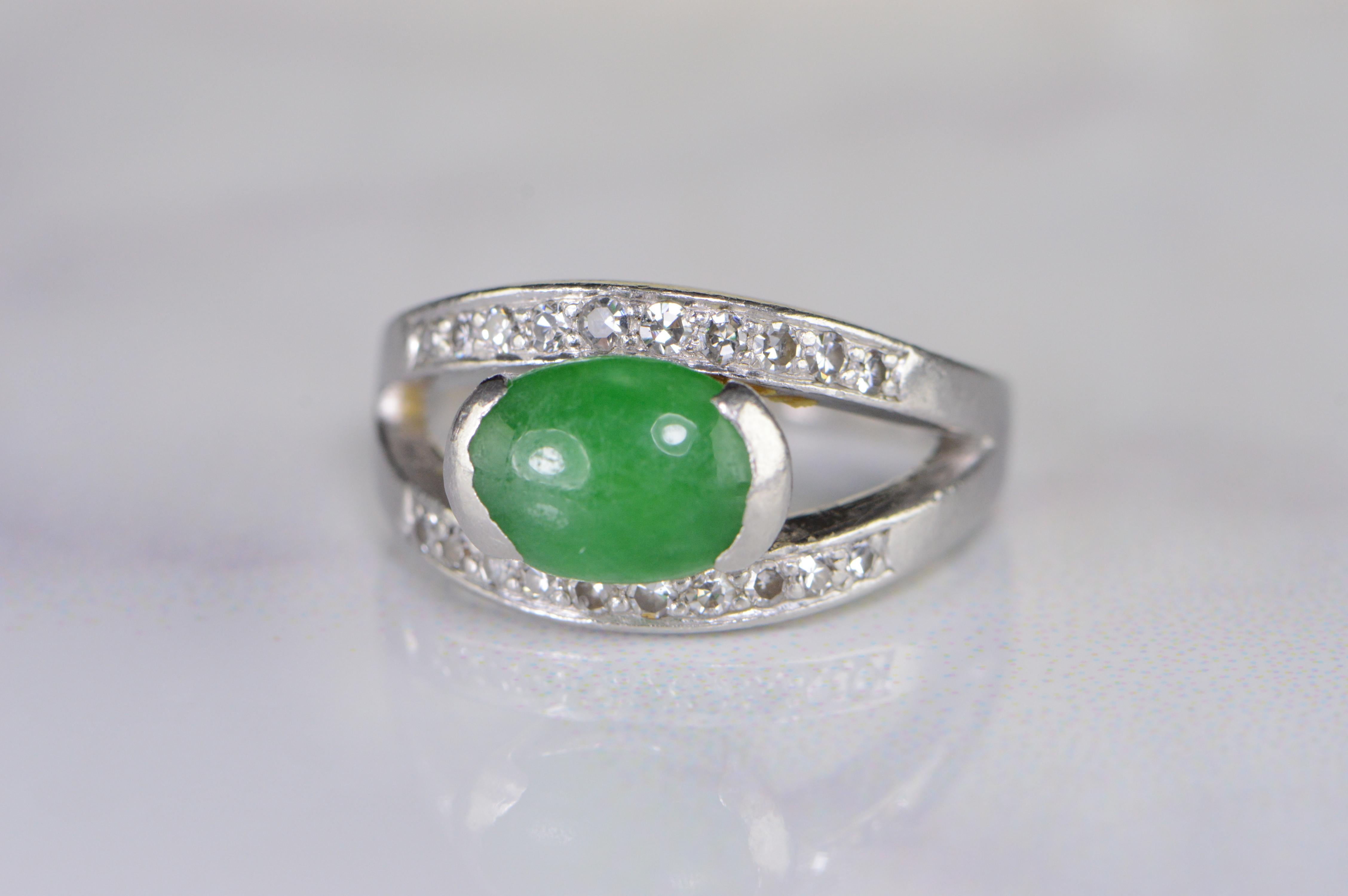 Oval Green Jade Round Brilliant Diamond Retro Platinum Ring, currently a size 5 but could easily be size. Total weight: 8.4 grams