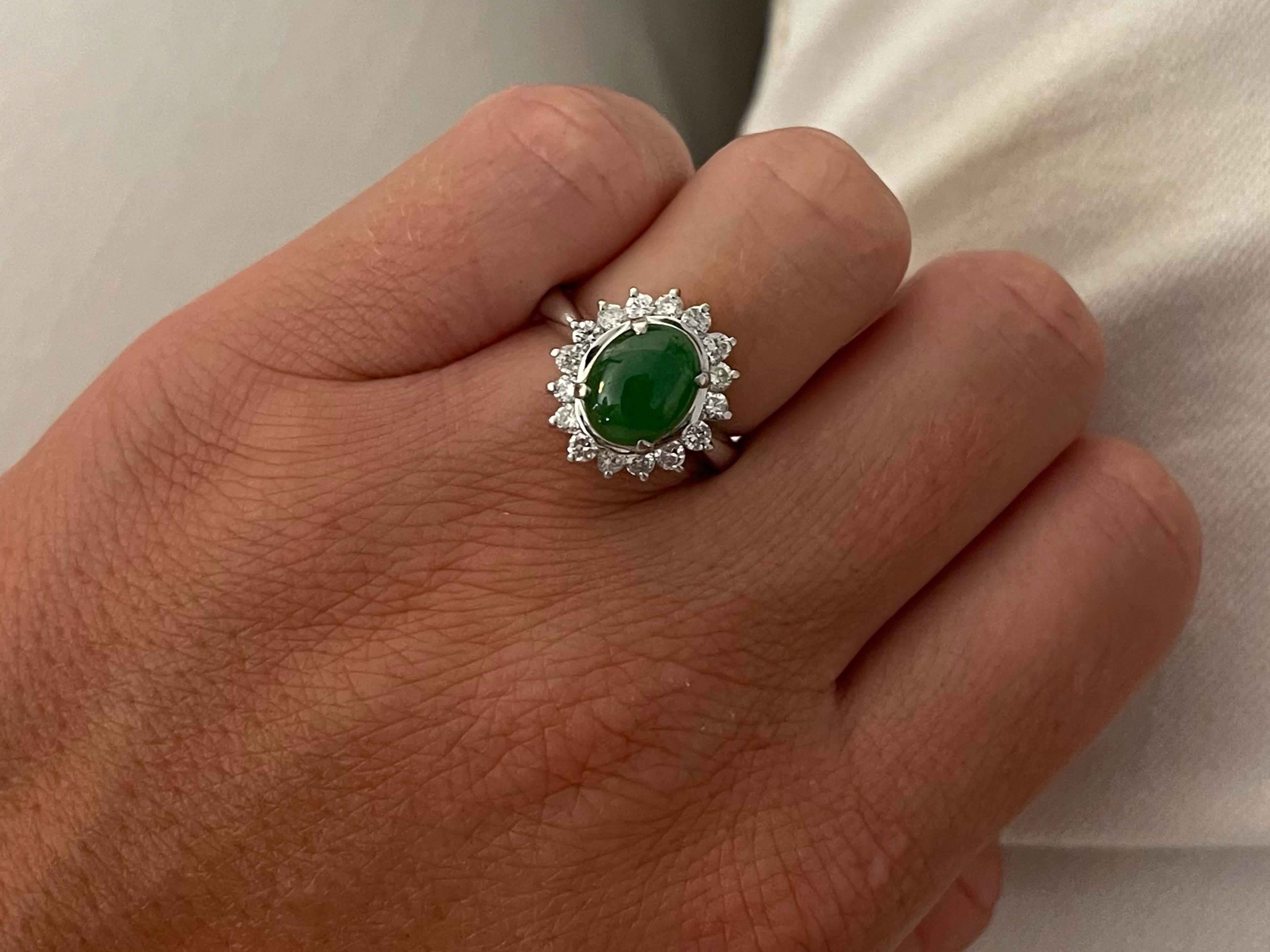 Item Specifications:

Metal: Platinum

Style: Statement Ring

Ring Size: 6 (resizing available for a fee)

Total Weight: 8.60 Grams

Gemstone Specifications:

Center Gemstone: Jadeite Jade

Shape: Oval

Color: Green

Cut: Cabochon 

Gemstone Weight: