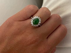 Oval Green Jadeite Jade Diamond Halo Ring in Platinum
