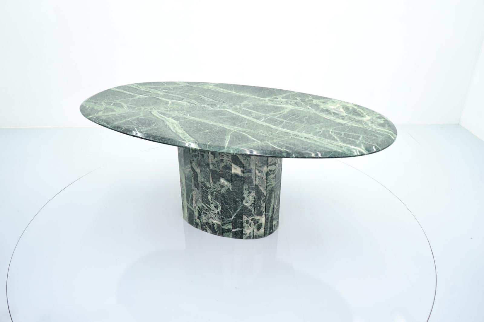 green marble oval dining table